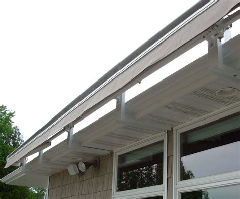 decorative metal awning brackets|retractable awning brackets.